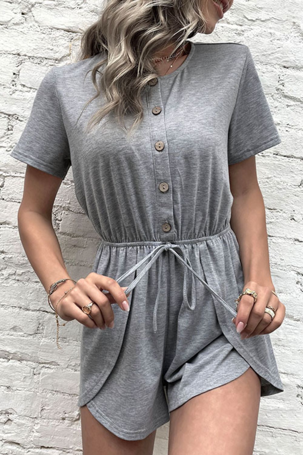 Perfee Buttoned Drawstring Round Neck Romper