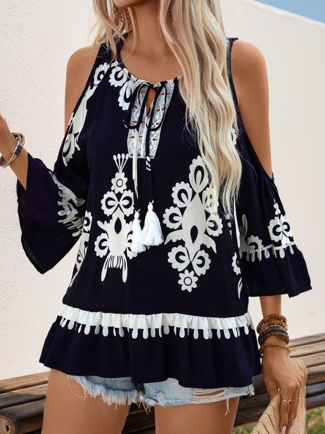 Perfee Tassel Printed Tie Neck Cold Shoulder Blouse