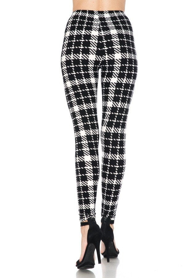 Multi Printed, High Waisted, Leggings With An Elasticized Waist Band.